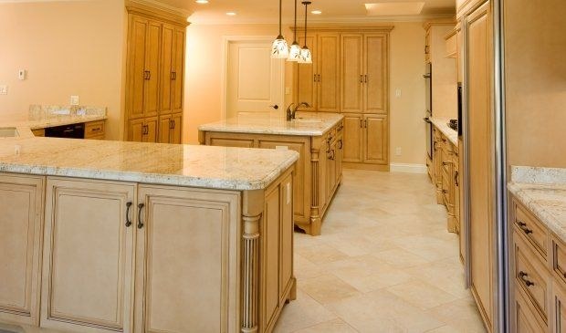 Kitchen run and island in granite, by Roman Marble Shop